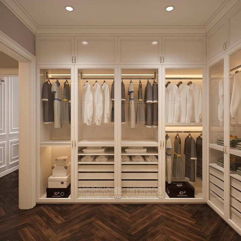 Mẫu tủ quần áo hiện đại với thiết kế nhiều ngăn tủ khác nhau, những ngăn lớn để treo quần áo sử dụng cánh kính và những ngăn nhỏ để đồ gấp,… thì có thể sử dụng cánh gỗ