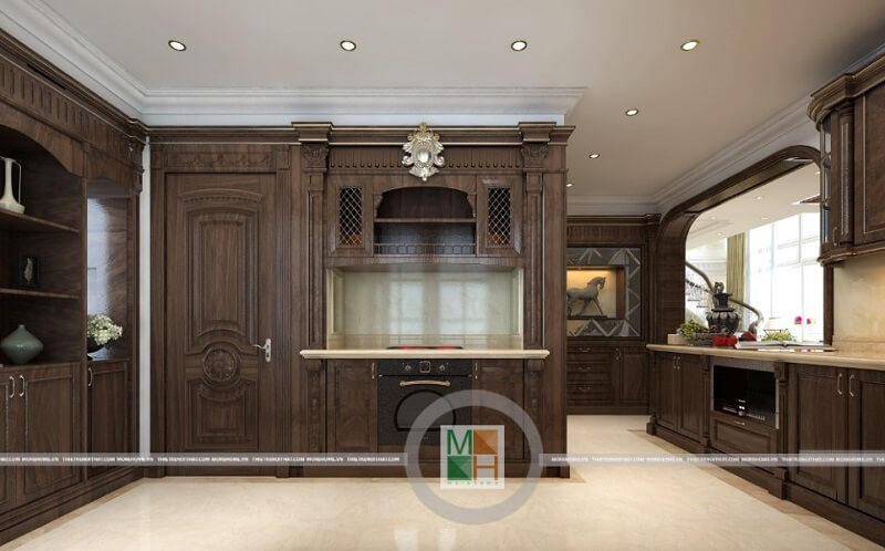 Thiết kế nội thất phòng bếp chung cư đẹp với hệ tủ bếp gỗ tự nhiên màu nâu trầm mang đến vẻ đẹp sang trọng, đẳng cấp cho căn phòng.